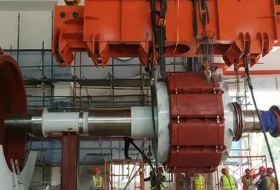 Hydro-generator rotors are hoisted by hand hoist in hydropower station